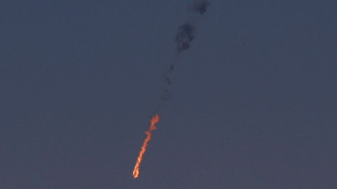 A Syrian fighter jet is in flames Tuesday after being hit by the Israeli military over the Golan Heights.