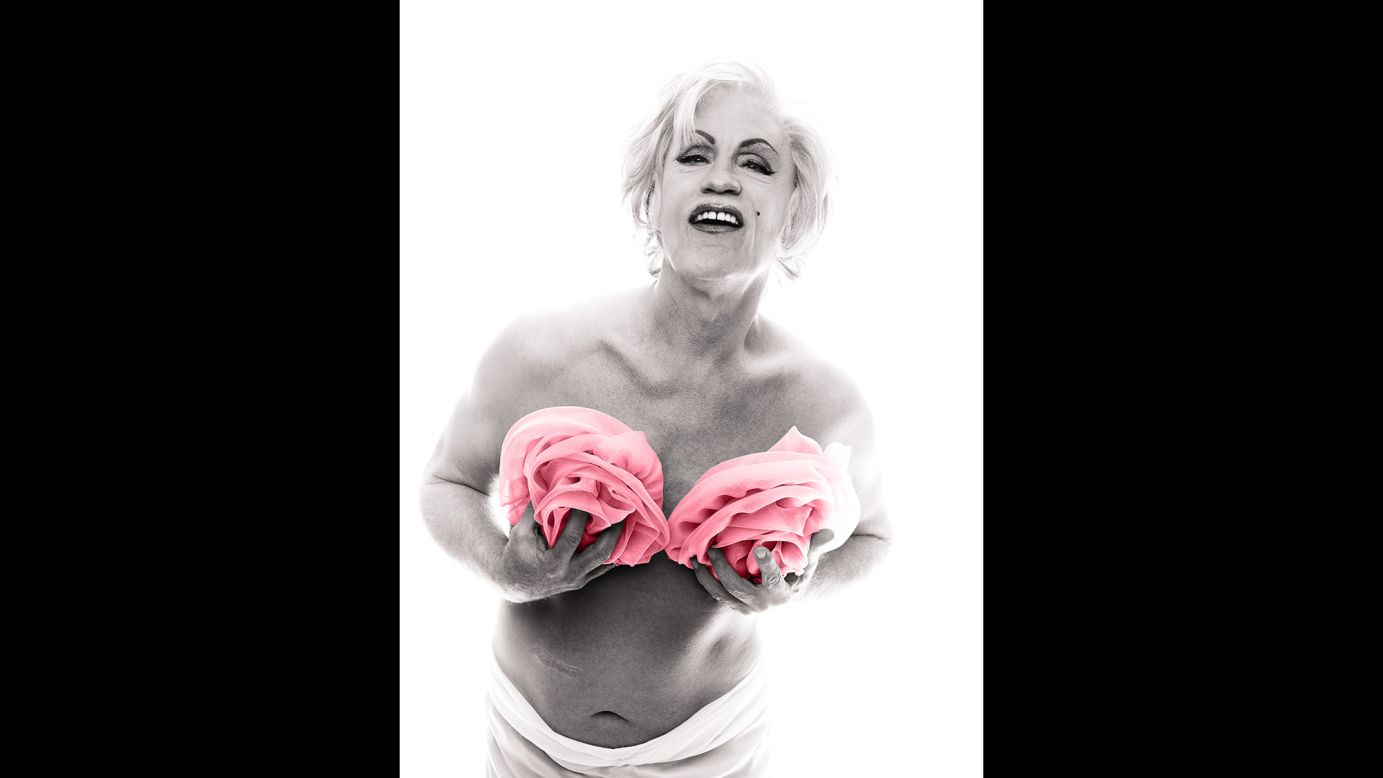 Malkovich mimics Bert Stern's "Marilyn in Pink Roses" (1962).