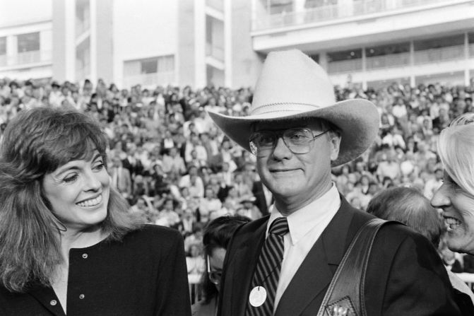 Hollywood actor Larry Hagman, pictured with fellow former "Dallas" star Linda Gray, is among the celebrities who have been attracted to Longchamp.