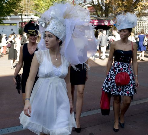 Longchamp fashion is invariably eye-catching, with hats often the prime clothing item on show.