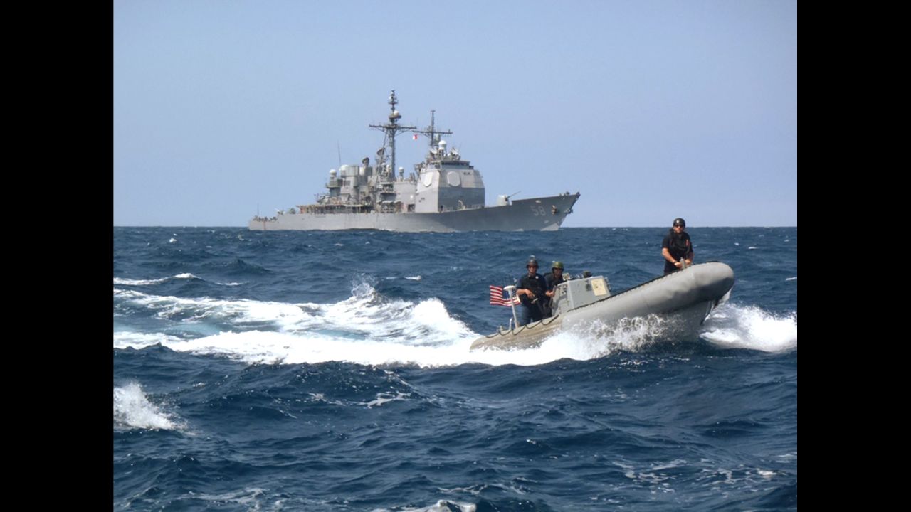 The guided-missile cruiser USS Philippine Sea, operating in international waters in the North Arabian Gulf, launched Tomahawk cruise missiles used against ISIS targets in Syria in some of the initial strikes on ISIS. The ship has a displacement of 9,589 tons and carries a crew of 370.