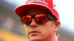 SINGAPORE - SEPTEMBER 21: Kimi Raikkonen of Finland and Ferrari takes part in the drivers' parade before the Singapore Formula One Grand Prix at Marina Bay Street Circuit on September 21, 2014 in Singapore, Singapore. (Photo by Mark Thompson/Getty Images)