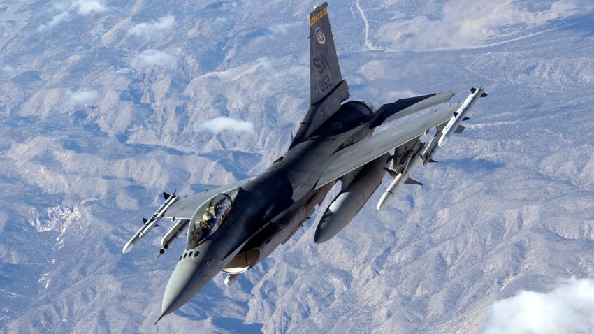  DoD photo by Master Sgt. Kevin J. Gruenwald, U.S. Air Force. (Released) A U.S. Air Force F-16 Fighting Falcon heads out to the combat ranges of Nellis Air Force Base, Nev., for airpower training exercise Red Flag 06-1, on Jan. 30, 2006. Conducted by the 414th Combat Training Squadron, Red Flag exercises test aircrews' war-fighting skills in realistic combat situations and involve units of the U.S. Air Force, Army, Navy, Marine Corps, as well as units of the United Kingdom and Australia. This Fighting Falcon is attached to the 20th Fighter Wing, Shaw Air Force Base, S.C.   DoD photo by Master Sgt. Kevin J. Gruenwald, U.S. Air Force. (Released) 
