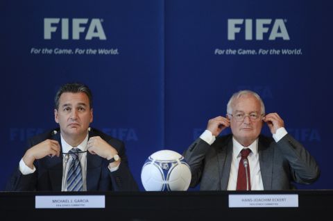 Michael Garcia (left) handed his report on the bidding process for the 2018 / 2022 World Cups to the FIFA Ethics Committee. Garcia has also called for the findings of his report to be made public.