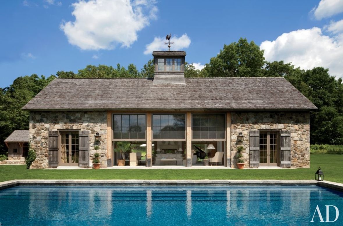 This stunning open-air pool house in Connecticut was created by designer John Cottrell and architect Gil Schafer.  <br /><br /><a href="http://designfile.architecturaldigest.com/gallery/poolhouses?mbid=synd_cnnstyle" target="_blank" target="_blank">Go here for more gorgeous pool houses.</a> <br /><br /><em>More from Architectural Digest:</em><br /><a href="http://www.architecturaldigest.com/celebrity-homes/2011/will-and-jada-pinkett-smith-home-slideshow?mbid=synd_cnnstyle" target="_blank" target="_blank">Will and Jada Pinkett Smith at Home </a><br /><a href="http://www.architecturaldigest.com/blogs/the-aesthete/2014/08/best-entrance-halls-slideshow_slideshow?mbid=synd_cnnstyle" target="_blank" target="_blank">Stunning Entrance Halls </a><br /><a href="http://www.architecturaldigest.com/celebrity-homes/2013/george-clooney-cindy-crawford-rande-gerber-mexico-baja-houses-slideshow?mbid=synd_cnnstyle" target="_blank" target="_blank">Cindy Crawford, Rande Gerber and George Clooney's Neighboring Mexican Villas </a>