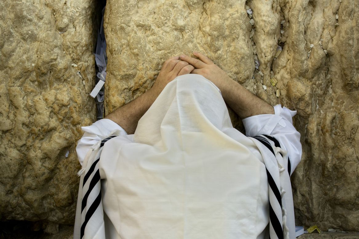 SEPTEMBER 25 - JERUSALEM: An ultra-Orthodox man prays at the Western Wall, <a href="http://edition.cnn.com/2014/09/24/world/meast/jewish-new-year-shofar/">marking Rosh Hashanah</a>, the beginning of year 5,775 in the Jewish calendar. Jews believe the occasion is a time for reflection and repentance and is referred to as the "day of judgment" or the "day of repentance."