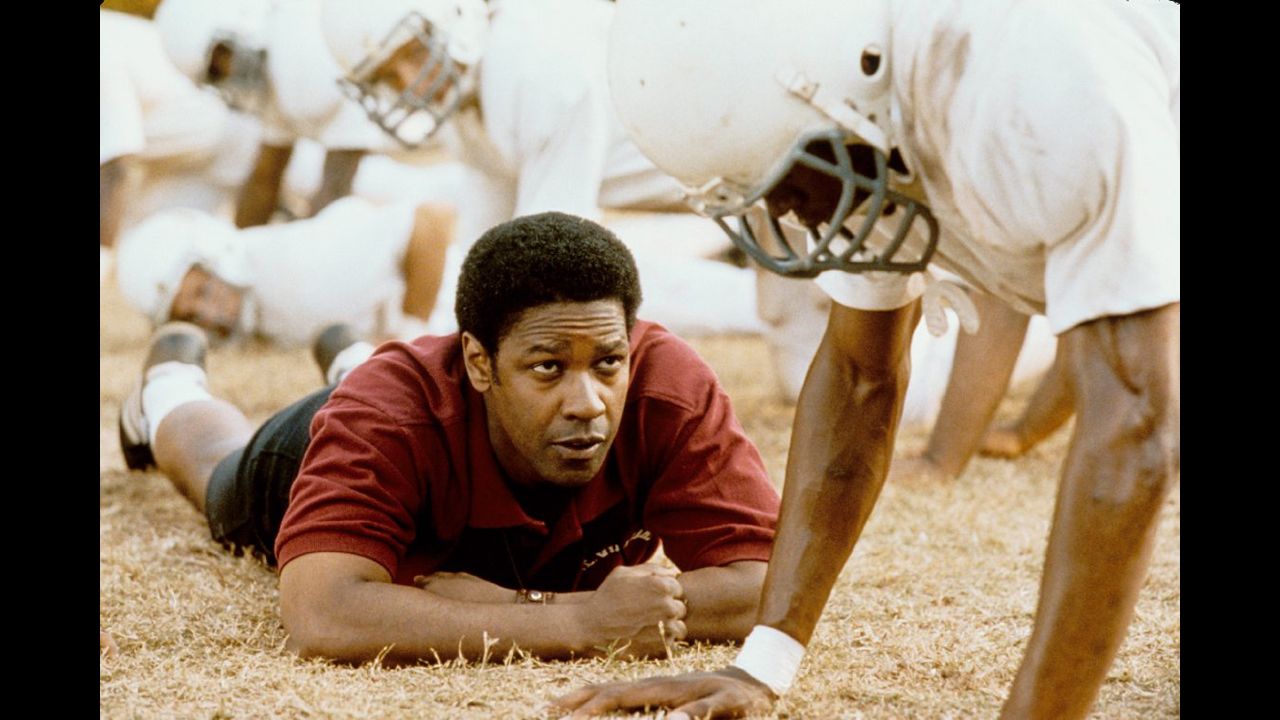 <strong>"Remember the Titans" (2000)</strong>: Yes, this is a Disney film through and through, right on down to synchronized dance routines and a feel-good ending. But Washington's Coach Boone is impossible not to love here, and his firm but gracious approach to uniting a freshly integrated football team will probably make you cry. Just a warning. 