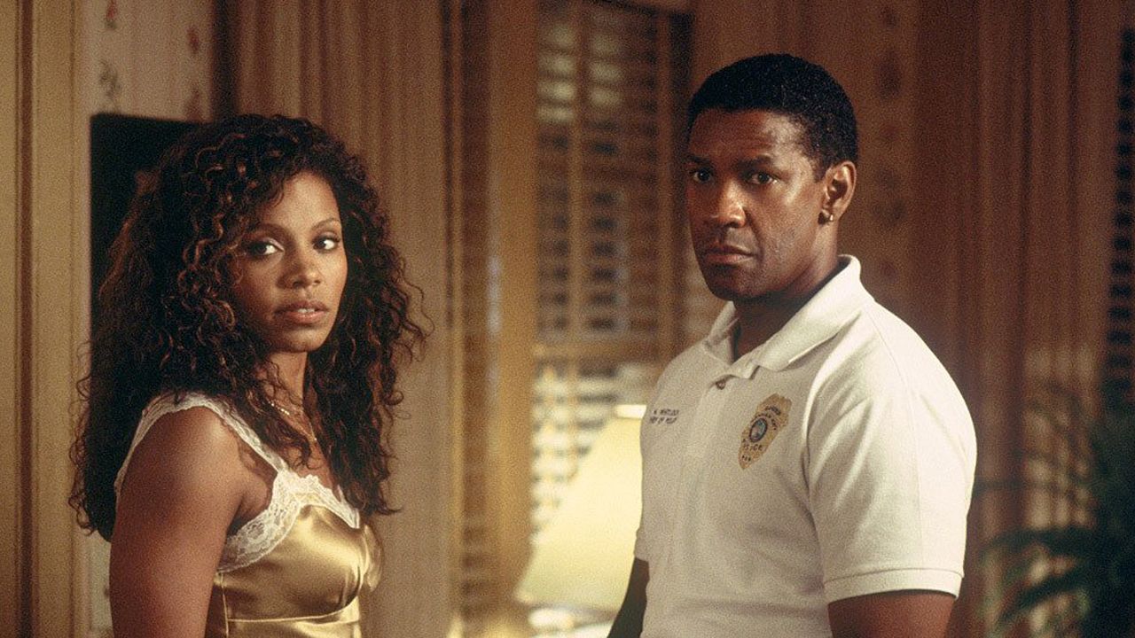 <strong>"Out of Time" (2003)</strong>: Perhaps it was the rush of playing a dirty cop in "Training Day," or maybe Washington just wanted more action in his life, but he spent much of the aughts inhabiting crime thrillers. It wasn't an Oscar-worthy drama, but "Out of Time" was a lot of fun -- and Washington excelled as the not-so-upstanding police officer-turned-murder suspect. Sanaa Lathan, left, also starred. 