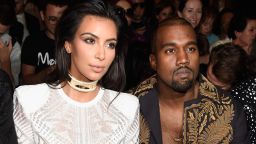 Kim Kardashian and Kanye West attend the Balmain show as part of the Paris Fashion Week Womenswear SpringSummer 2015 on September 25, 2014 in Paris, France. (Photo by Pascal Le Segretain/Getty Images)