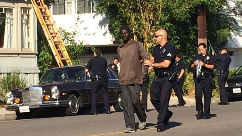 Photos Show Intruder Following Woman Onto Roof | CNN