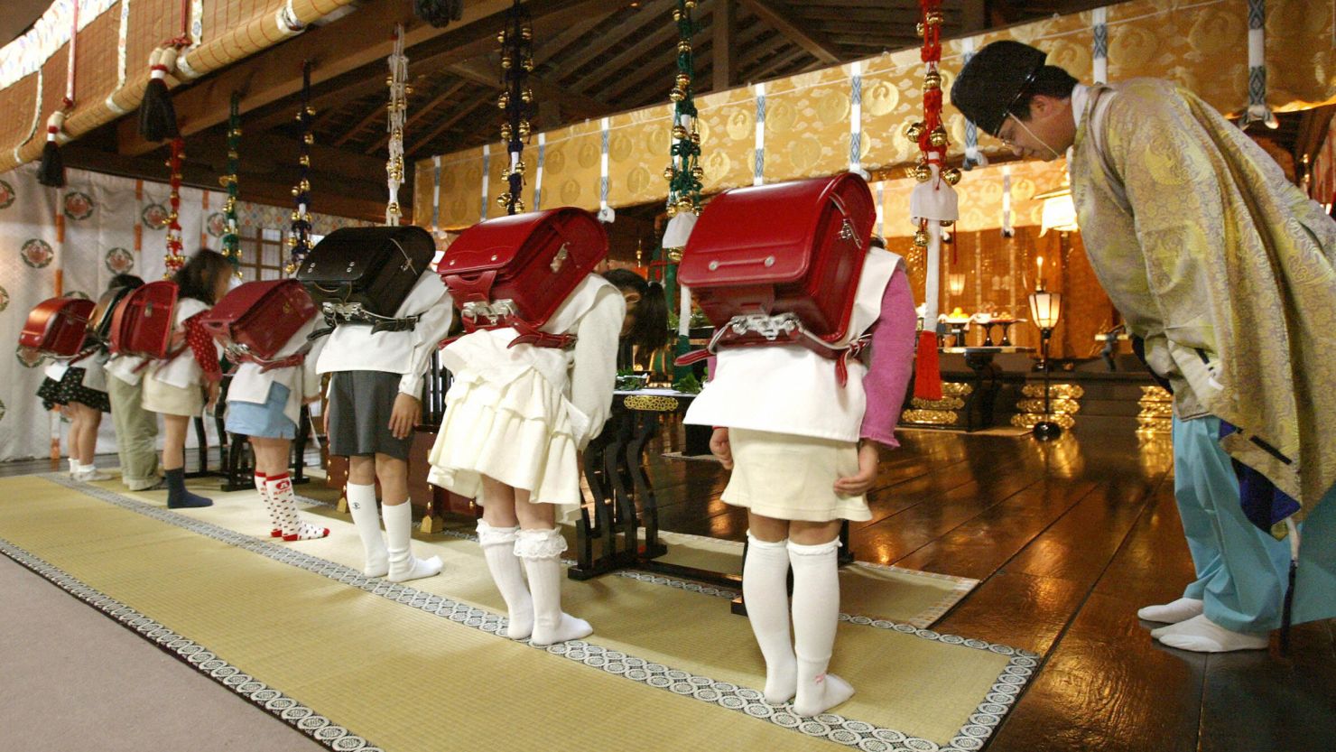 The traditional satchel (randoseru in Japanese) is a mandatory item for first year elementary school kids. The students and their schoolbags are purified at a ceremony at a Shinto shrine to pray for safety.