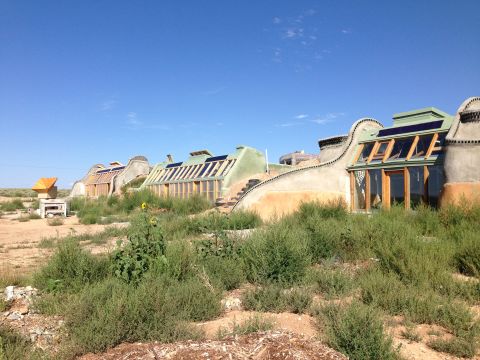 The exterior of an Earthship passive solar home.