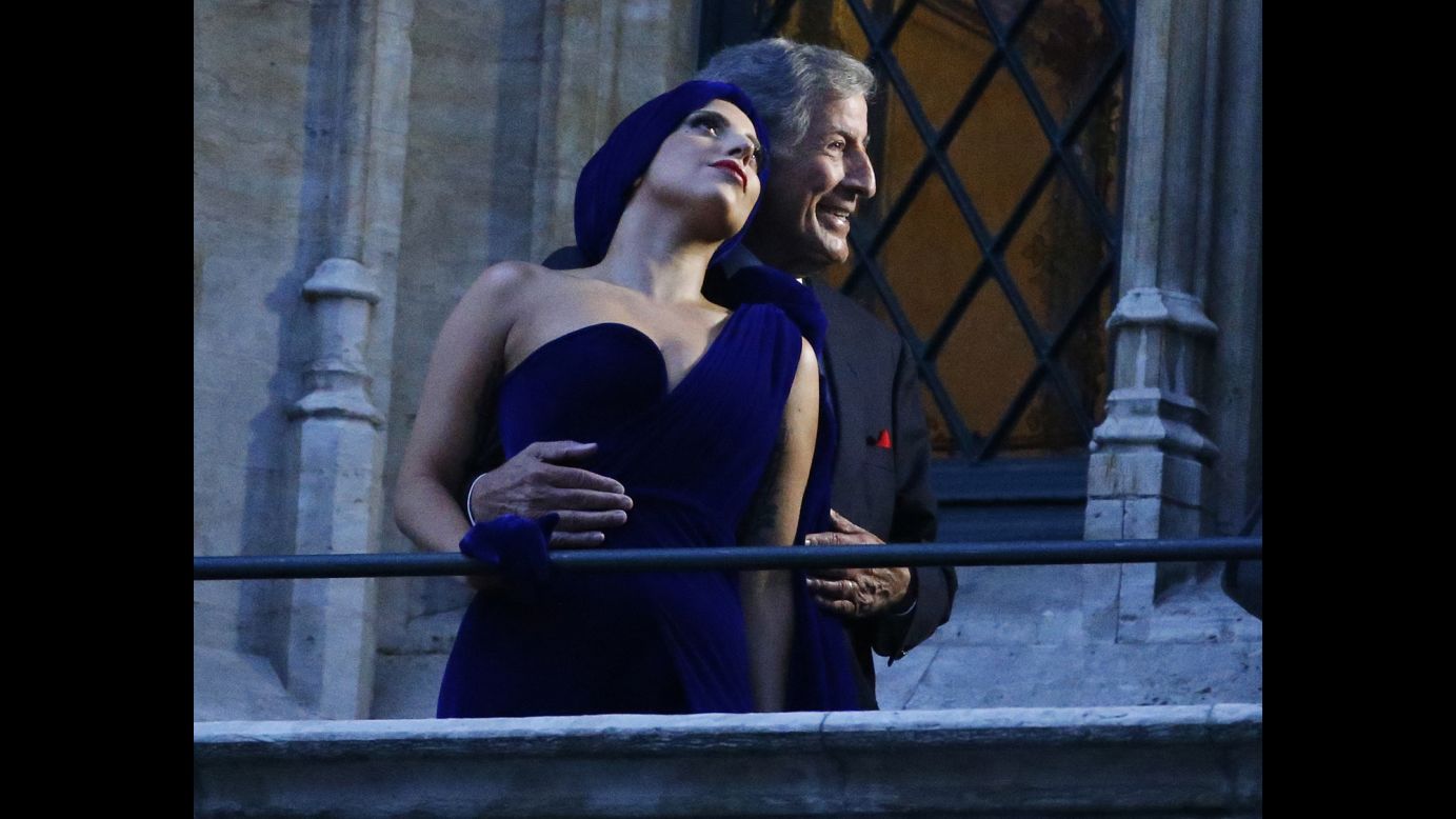 Singers Tony Bennett and Lady Gaga pose on a balcony in Brussels, Belgium, before performing at a concert together on Monday, September 22. The two recently collaborated on an album called "Cheek to Cheek."