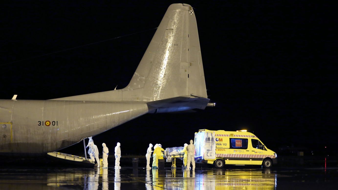Medics in Madrid transport Garcia Viejo, a 69-year-old Spanish priest diagnosed with the Ebola virus, into an ambulance on Monday, September 22. Viejo had arrived by plane via Sierra Leone, the West African country he was working in when he became infected. 