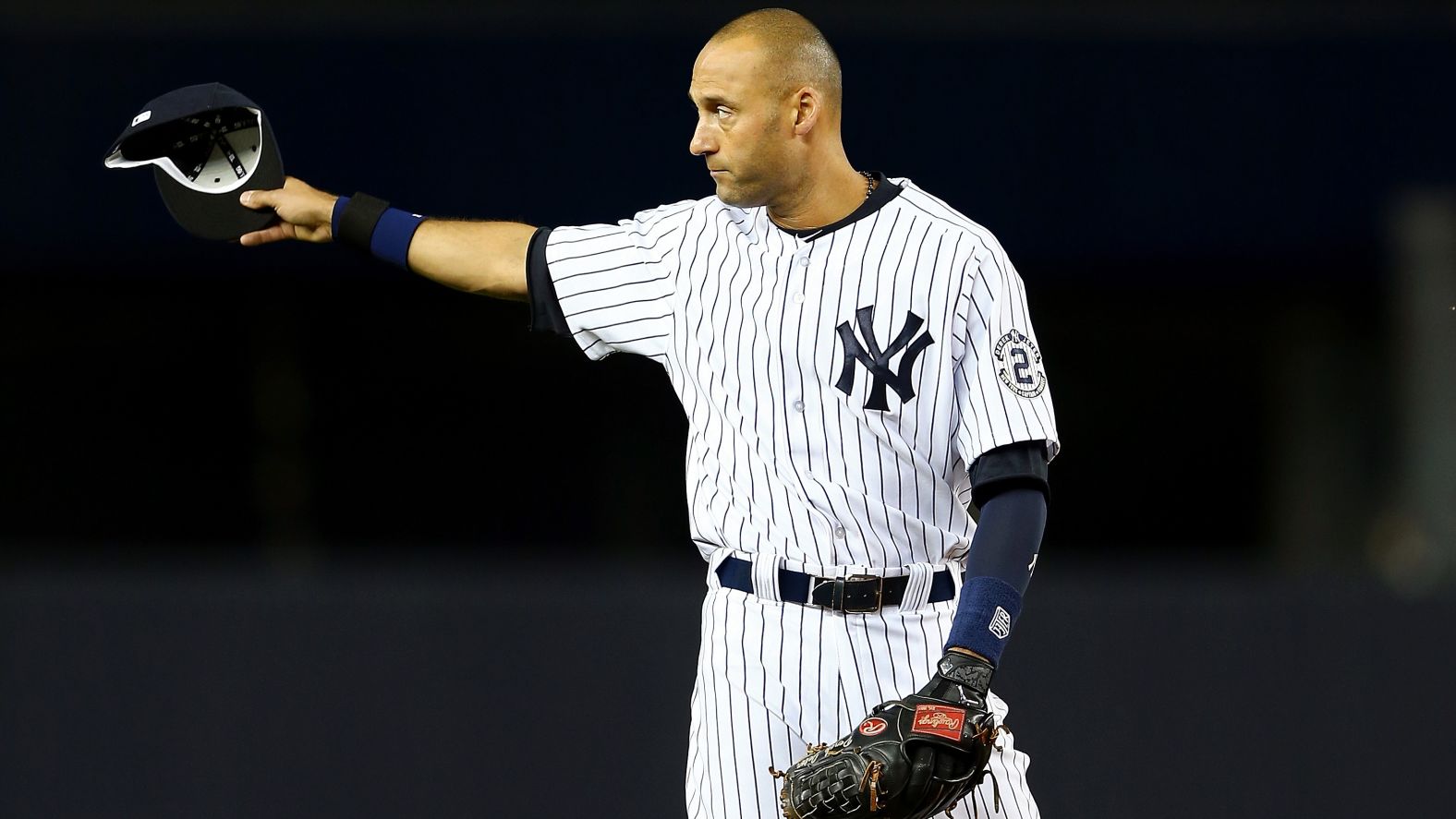 Jeter gestures to the fans during his last game at Yankee Stadium.