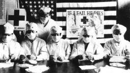 UNSPECIFIED - JANUARY 27:  Red Cross volunteers fighting against the spanish flu epidemy in United States in 1918  (Photo by Apic/Getty Images)