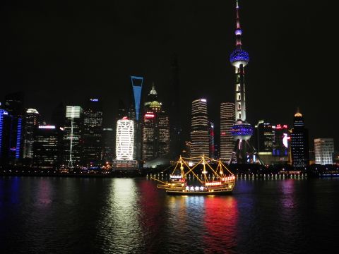 The vibrant glow of <a href="http://ireport.cnn.com/docs/DOC-1131116">Pudong</a>, a waterfront area in central Shanghai, reflects against the calm waters of China's Huangpu River. Get to know Shanghai better during the premiere of CNN's <a href="http://cnn.com/video/shows/anthony-bourdain-parts-unknown/">"Anthony Bourdain: Parts Unknown"</a> on Sunday, September 28, at 9 p.m. ET. 