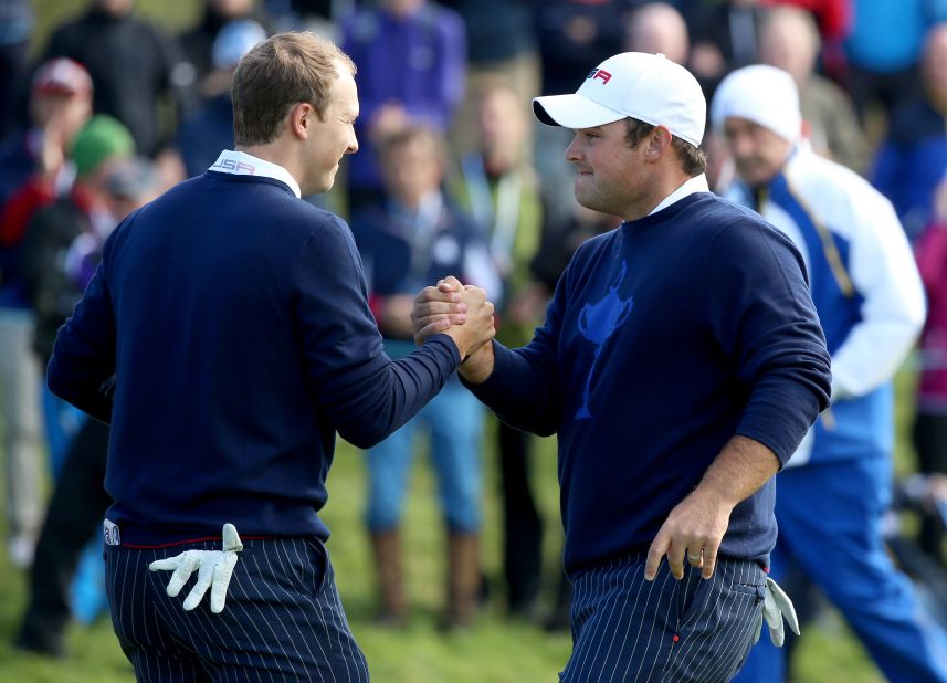 Poulter and partner Stephen Gallacher were unable to contain the U.S. pairing of Jordan Spieth (left) and Patrick Reed who ran out comfortable 5&4 winners, giving Team USA their first point.   
