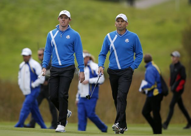 Rory McIlroy (left) and Sergio Garcia banished the disappointment of losing in the morning fourballs with a gutsy performance in the afternoon foursomes. The pair won the final two holes to claim a half against Ricky Fowler and Jimmy Walker. 