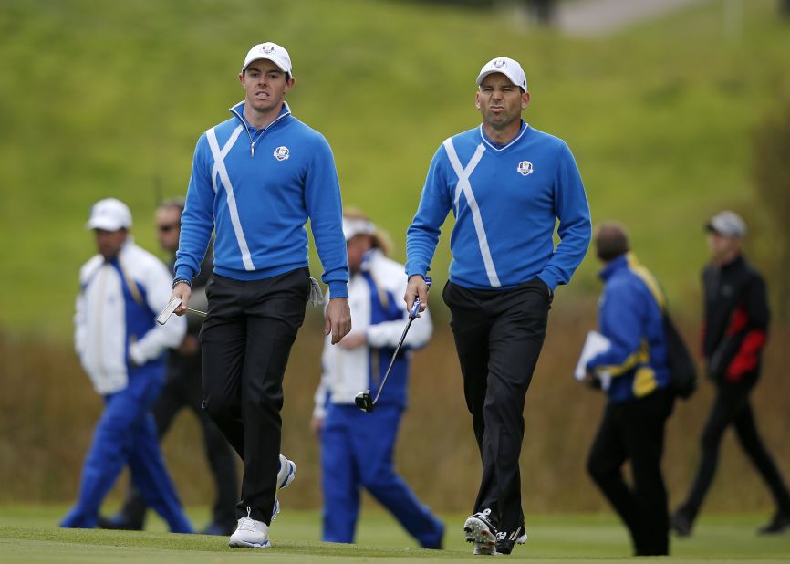 Rory McIlroy (left) and Sergio Garcia banished the disappointment of losing in the morning fourballs with a gutsy performance in the afternoon foursomes. The pair won the final two holes to claim a half against Ricky Fowler and Jimmy Walker. 