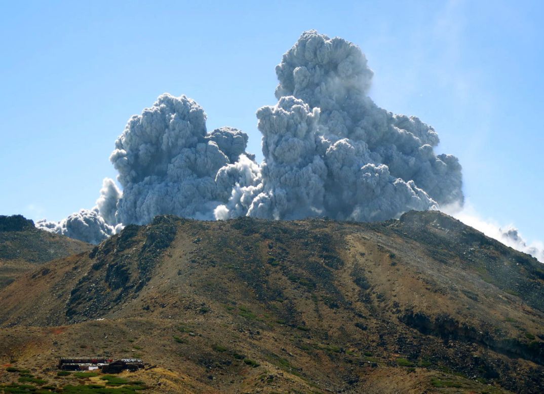 Plumes of smoke and ash rise over Mount Ontake on Saturday, September 27. 