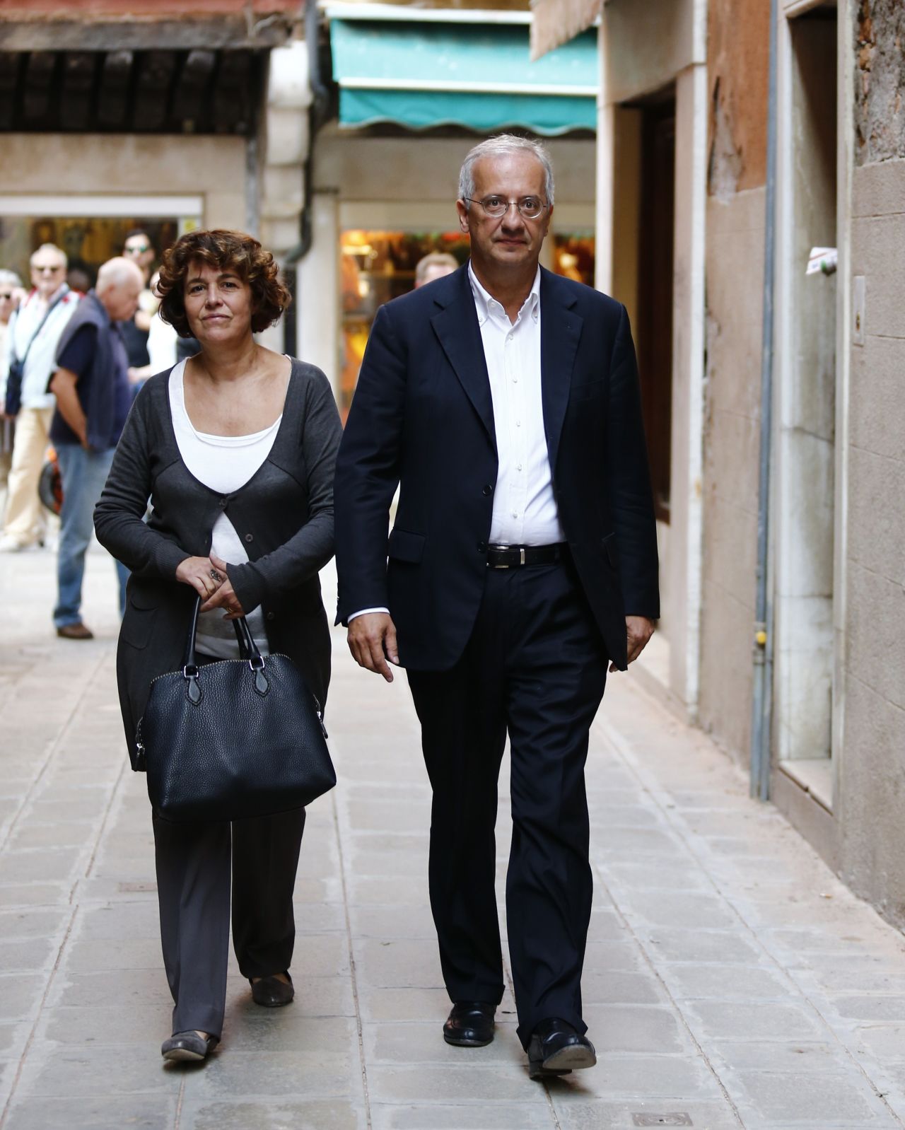 The former mayor of Rome, Walter Veltroni, and his wife, Flavia Prisco, arrive for the wedding.