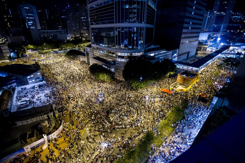 Protesters gather during a demonstration outside the headquarters of the Legislative Counsel on September 28 as calls for Beijing to grant the city universal suffrage grow louder and more fractious.