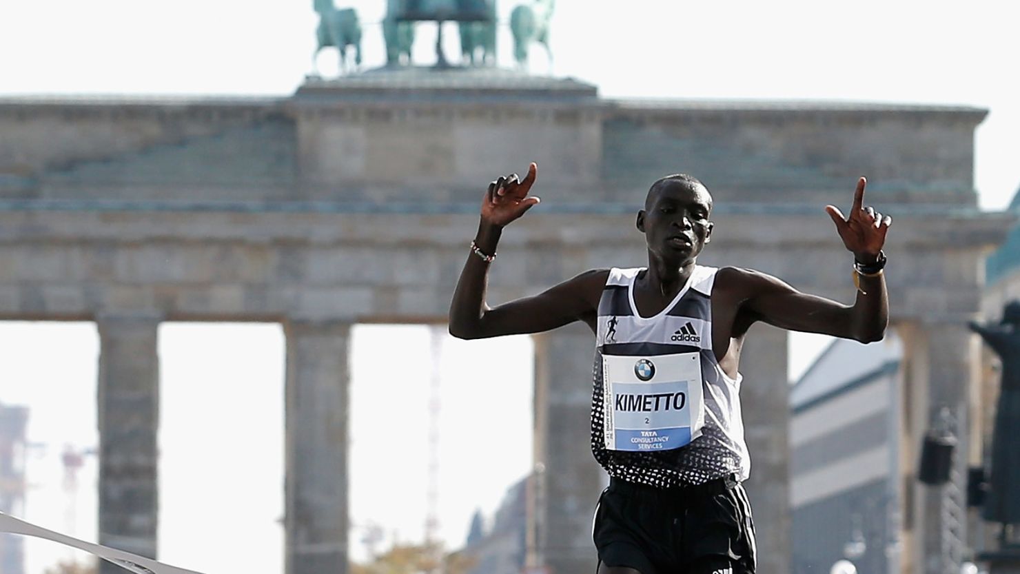 Kenya's Dennis Kimetto breasts the tape in front of the Brandenberg Gate as he sets a new world record in the marathon.