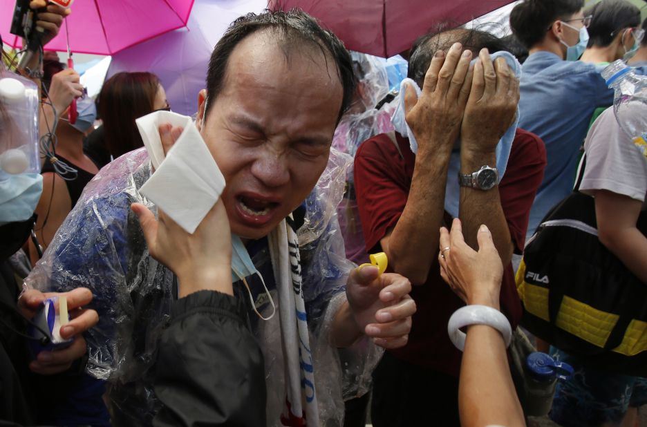 Police use pepper spray and tear gas against demonstrators September 28. The protests, which have seen thousands of students in their teens and 20s take to the streets, swelled in size over the weekend.
