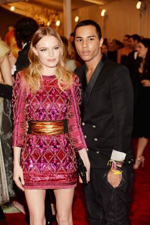 His designs have a loyal celebrity following, including actress Kate Bosworth, who Rousteing is pictured with at last year's Met Gala.