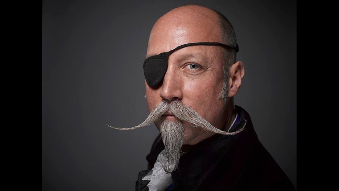 Al Underwood competes in the Musketeer category. The Musketeer mustache is long and slim while the beard is kept small and pointed. Eyepatch optional.