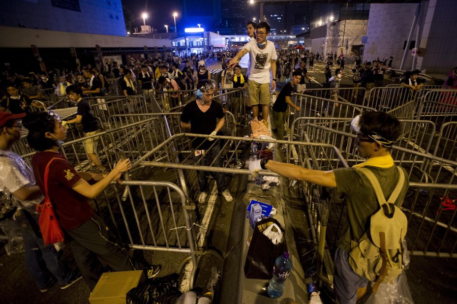 Students erect barricades in the main protest area adjacent to the Hong Kong government buildings.