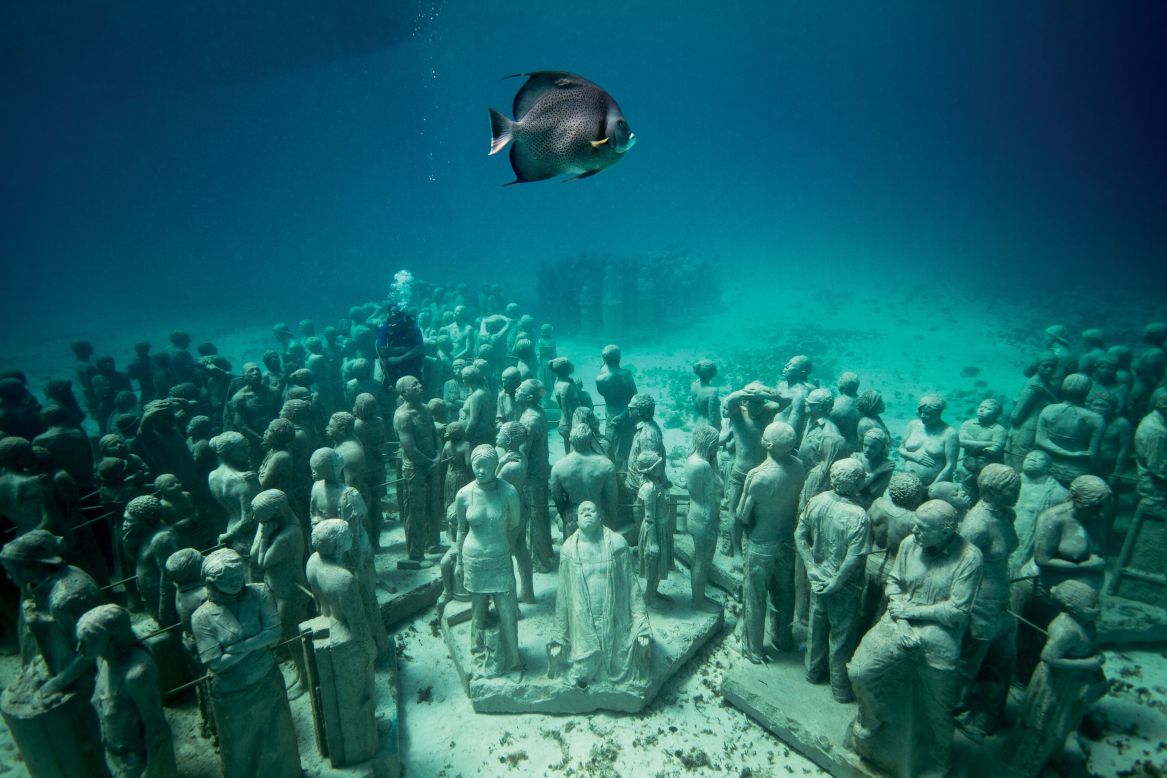 <em>The Silent Evolution (Mexico), Jason deCaires Taylor, 2010</em><br /><br />This British artist has become internationally acclaimed for his underwater sculptures. Installed on the seabed, these predominantly figurative works are transformed into artificial reefs, which in turn increase marine biomass and provide a habitat for fish species. As well as providing an attraction that diverts tourist divers away from more fragile natural reefs, they often have an environmental message.