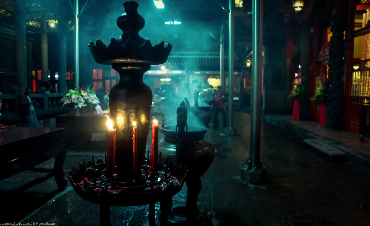 Incense and candles set the mood at <a href="http://ireport.cnn.com/docs/DOC-1152367">Longshan Temple</a> in Taipei, Taiwan. Walking through the temple "felt as if I traveled back hundreds of years to a time long forgotten," said Jeremy Aerts.