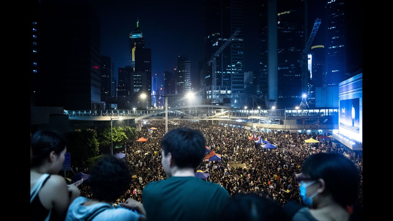 Pro-democracy demonstrators gather for a third night in Hong Kong on Tuesday, September 30. 