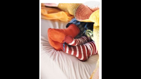 Place socks in the washer tub first, so they're less likely to attach themselves to other garments.