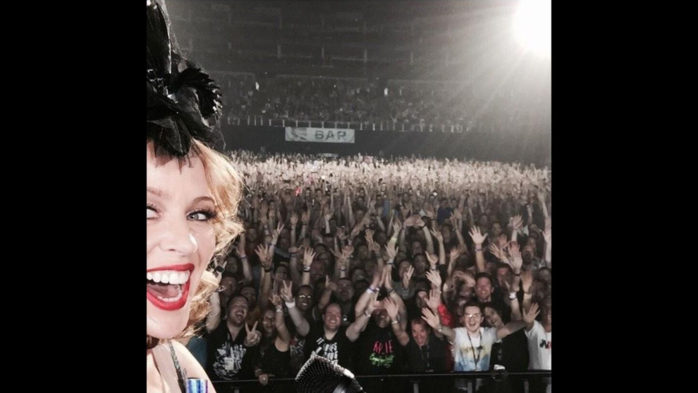 Singer Kylie Minogue takes a selfie with fans during a concert Monday, September 29, at the O2 Arena in London. "I had one chance to get this right ... thank u 4a great night," <a href="https://twitter.com/kylieminogue/status/516706946188337152" target="_blank" target="_blank">she wrote on Twitter.</a>