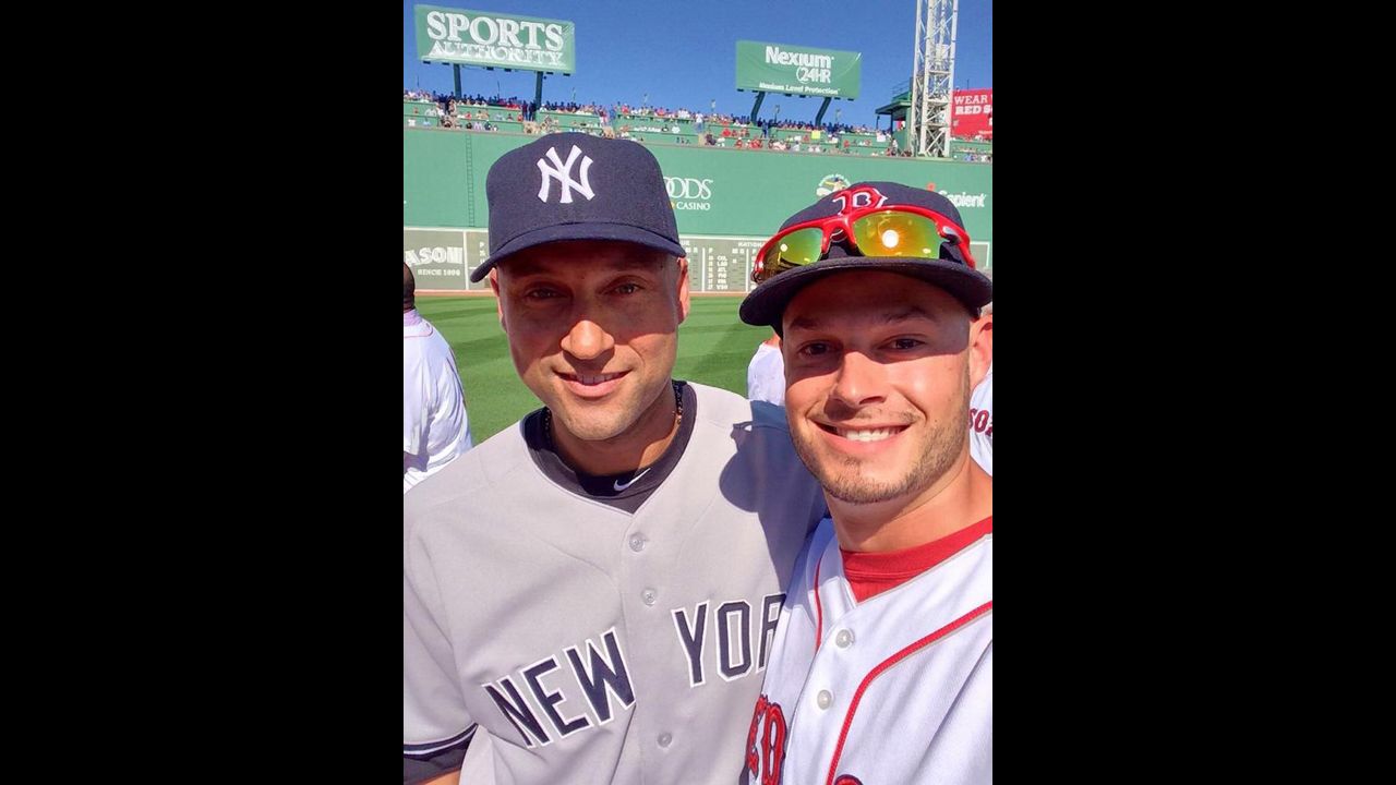 Boston Red Sox pitcher Joe Kelly, right, snaps a selfie with retiring New York Yankees captain Derek Jeter before Jeter played the final game of his career Sunday, September 28, in Boston. Kelly <a href="https://twitter.com/JosephKellyJr/status/516382468854013952" target="_blank" target="_blank">tweeted the photo</a> with the hashtags #RE2PECT and #2ELFIE in honor of Jeter's jersey number. <a href="http://www.cnn.com/2014/09/22/worldsport/gallery/derek-jeter/index.html">See photos from Jeter's 20-year career</a>