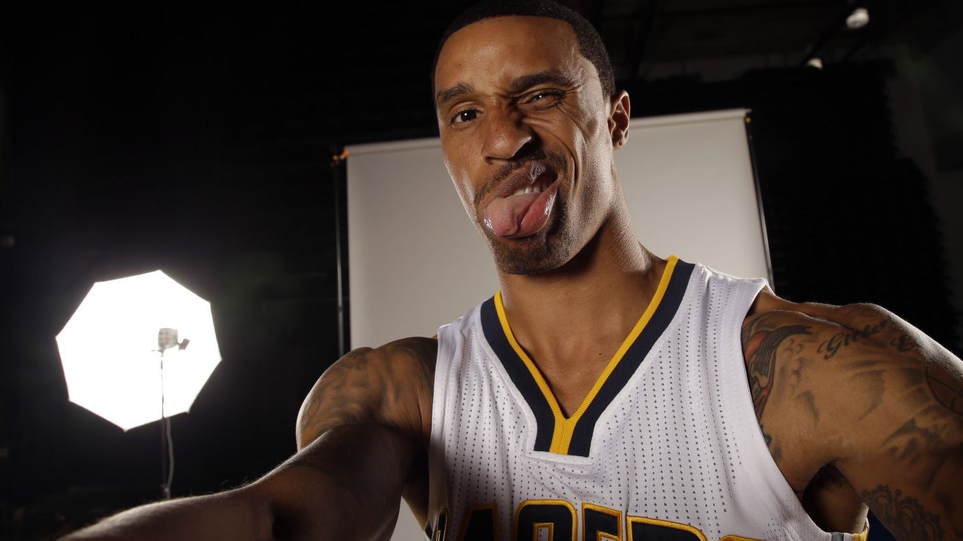 George Hill, a player with the NBA's Indiana Pacers, poses for a mock selfie during the team's media day Monday, September 29, in Indianapolis.