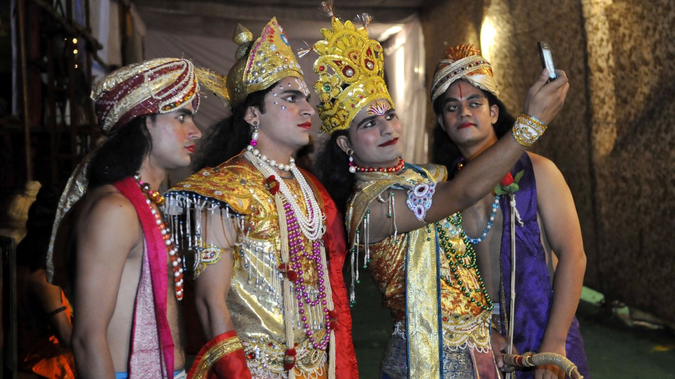 Ramlila actors pose for a selfie before performing Thursday, September 25, at a stadium in Noida, India. Ramlila is a dramatic folk re-enactment of the life of the Hindu Lord Rama.