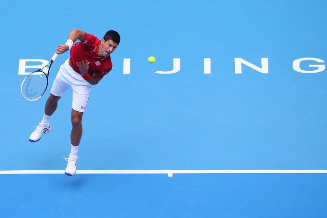 Novak Djokovic took his record in Beijing to 20-0 as he beat Spain's Guillermo Garcia-Lopez in his first match since his surprise U.S. Open semifinal defeat to Kei Nishikori. 