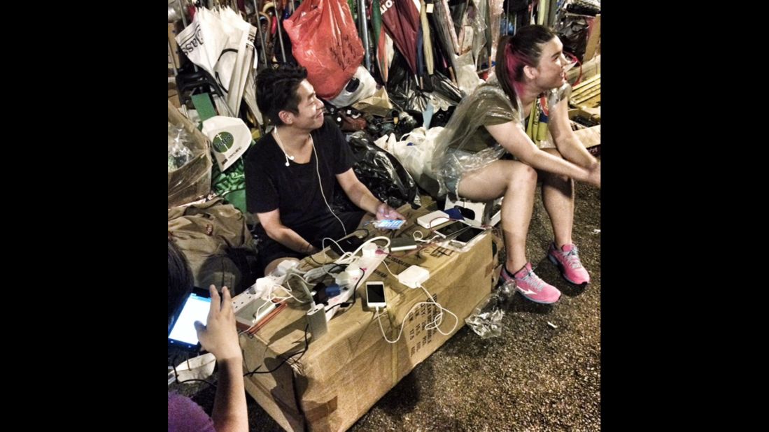 The importance of the smartphone in the Hong Kong protests was understood from the beginning. Here pro-democracy protesters charged phones at a makeshift street charging point in Hong Kong's Admiralty district.