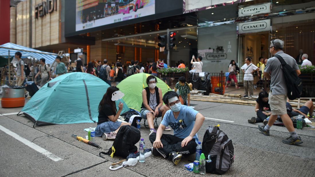 Protesters camp out in a street in Hong Kong on Wednesday, October 1. 