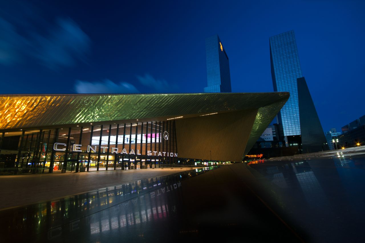 The centerpiece of Netherlands' Rotterdam Centraal Station's design is the main entrance. The shiny boomerang-like canopy is made of a stainless steel projection and wood cladding.