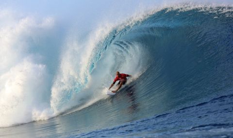 Slater rides a wave on August 18, 2014, during the 14th edition of the Billabong Pro Tahiti surf event in Teahupoo, Tahiti.