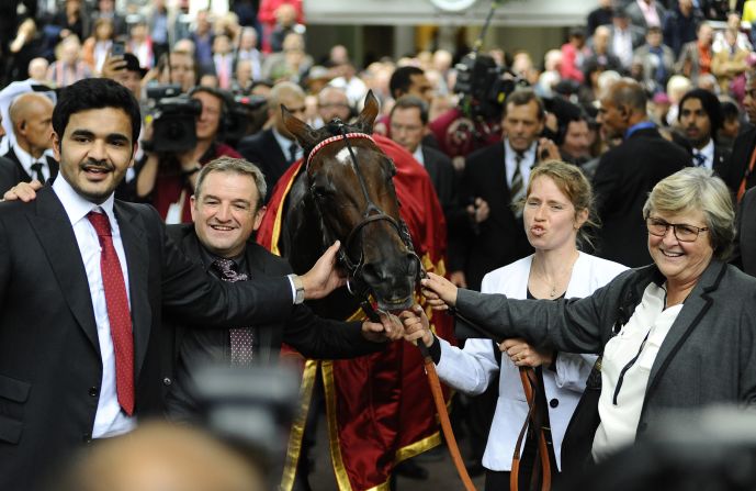 Last year's victory came 34 years after Head-Maarek (far right) trained her first winner in the Longchamp race.