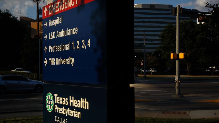 Caption:DALLAS, TX - SEPTEMBER 30: Traffic moves past Texas Health Presbyterian Hospital Dallas where a patient has been diagnosed with the Ebola virus on September 30, 2014 in Dallas, Texas. The patient who had recently traveled to Dallas from Liberia marks the first case of this strain of Ebola that has been diagnosed outside of West Africa. (Photo by Mike Stone/Getty Images)
