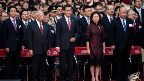 C.Y. Leung, center, attends a ceremony to mark the 65th anniversary of the founding of the People's Republic of Communist China on October 1.