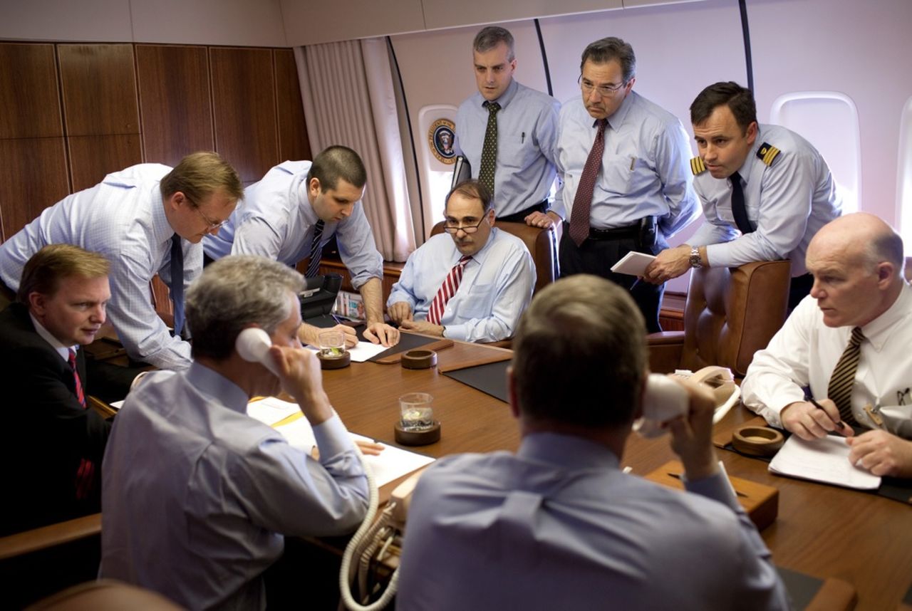 Clancy, far right, discusses security measures aboard Air Force One in April 2009.