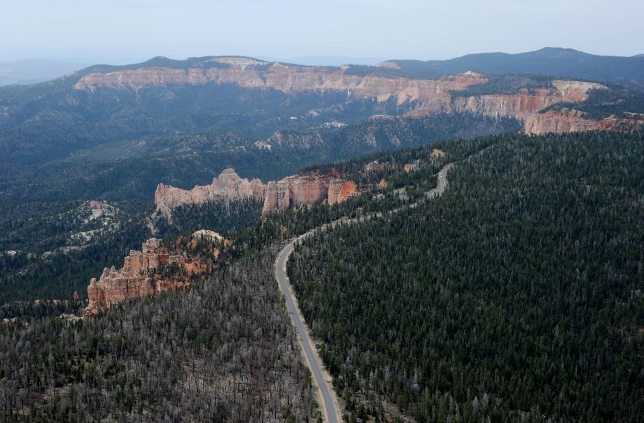 One of the most spectacular drives in the American West, Highway 12 in southern Utah passes two national parks, a national monument and a wide variety of scenery, including red-rock canyons and forested plateaus. This is an aerial view of Bryce Canyon National Park, famous for its rocky spires in pastel shades of red, pink and orange.